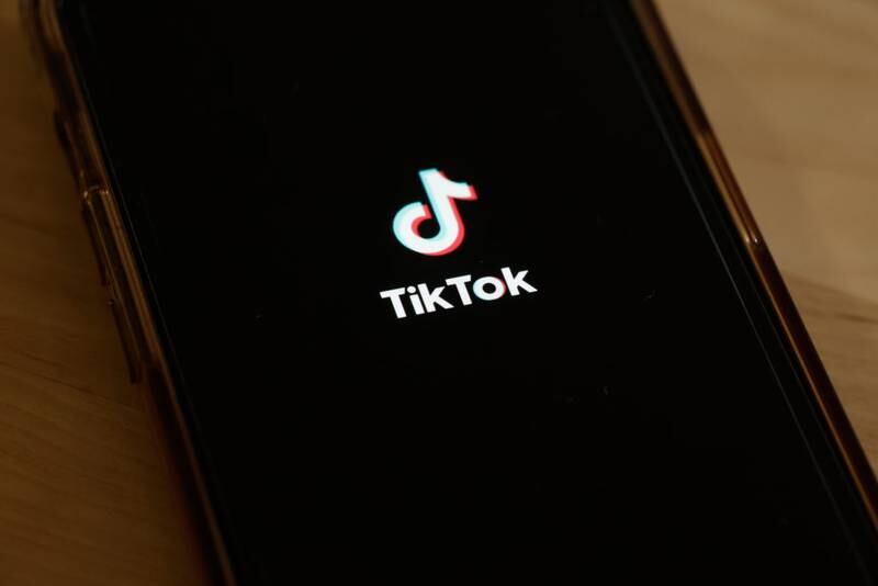 NEW YORK, NEW YORK - MARCH 13: In this photo illustration, the TikTok app is seen on a phone on March 13, 2024 in New York City. Congress is set to vote and pass a bill that could ban the popular app TikTok nationwide and be sent to the Senate for a vote. The bill would force the Chinese firm ByteDance to divest from TikTok and other applications that it owns within six months after passage of the bill or face a ban. Lawmakers argue that ByteDance is beholden to the Chinese government making the app a national security threat. (Photo Illustration by Michael M. Santiago/Getty Images)