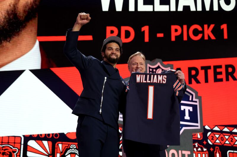 DETROIT, MICHIGAN - APRIL 25: (L-R) Caleb Williams poses with NFL Commissioner Roger Goodell after being selected first overall by the Chicago Bears during the first round of the 2024 NFL Draft at Campus Martius Park and Hart Plaza on April 25, 2024 in Detroit, Michigan. (Photo by Gregory Shamus/Getty Images)