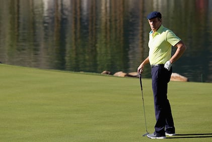 LA QUINTA, CA - JANUARY 17:  Michael Bolton plays the eighteenth hole on the Arnold Palmer Private Course at PGA West during the second round of the Humana Challenge in partnership with the Clinton Foundation on January 17, 2014 in La Quinta, California.  (Photo by Todd Warshaw/Getty Images)