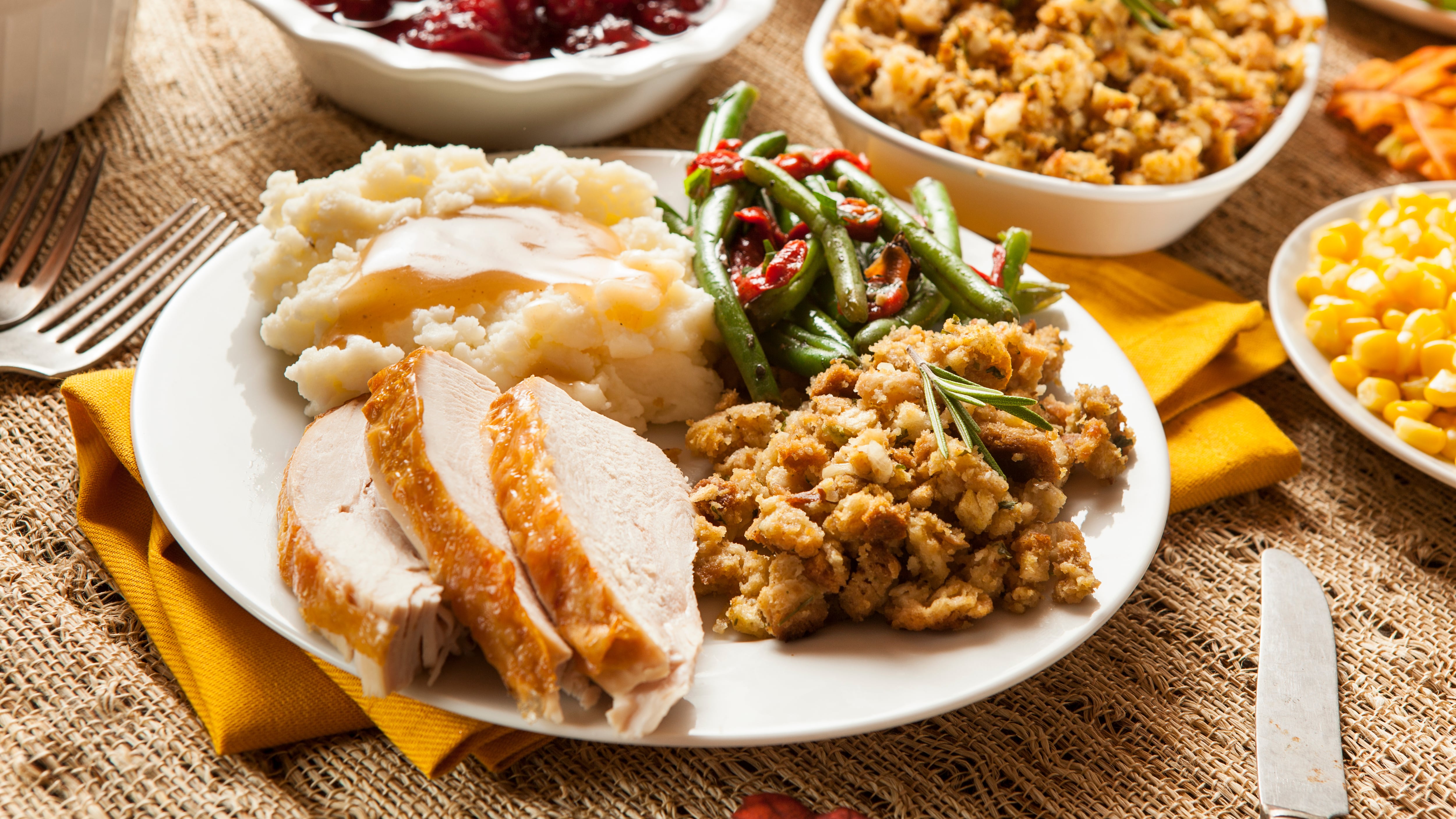 Homemade Turkey Thanksgiving Dinner with Mashed Potatoes, Stuffing, and Corn