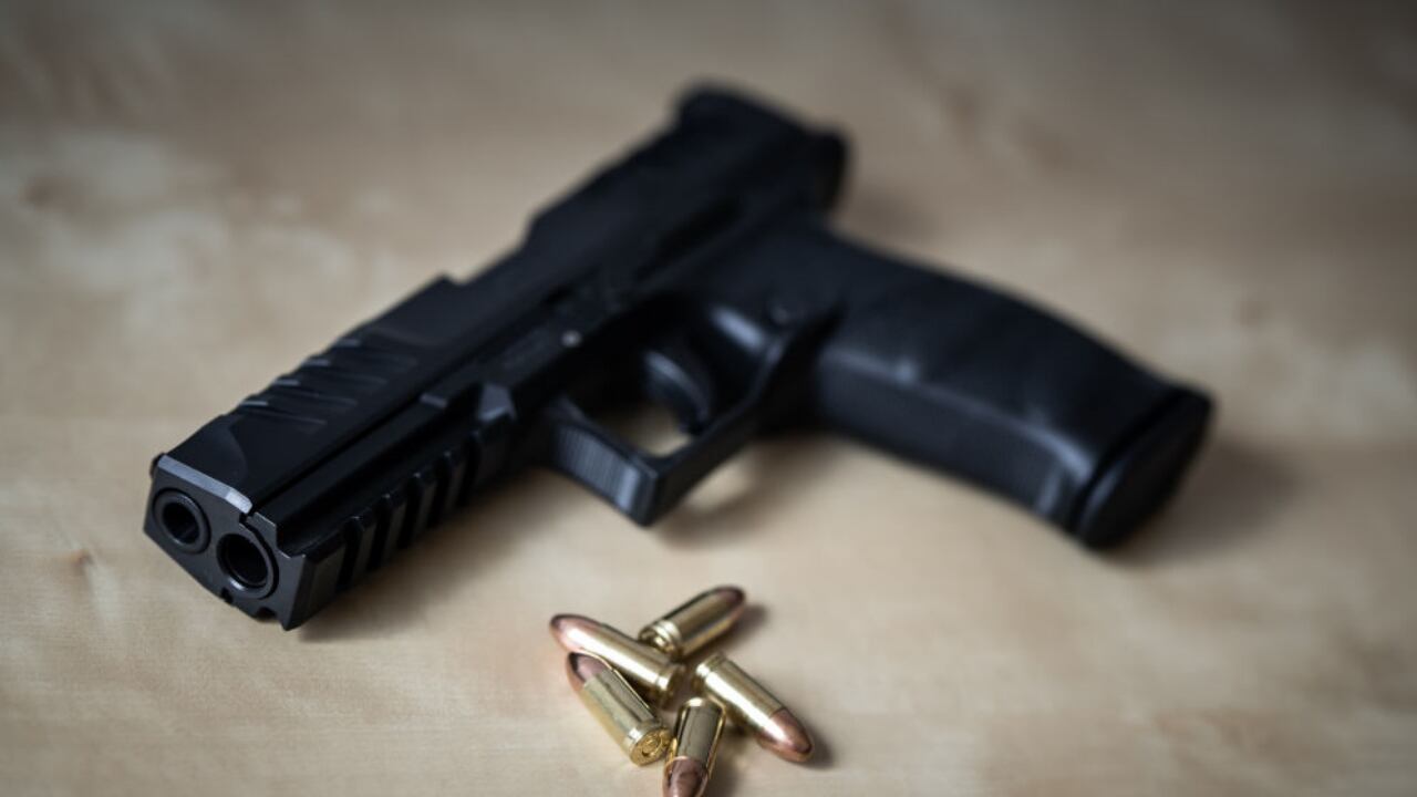 The man used his feet to load, unload and fire the weapon.