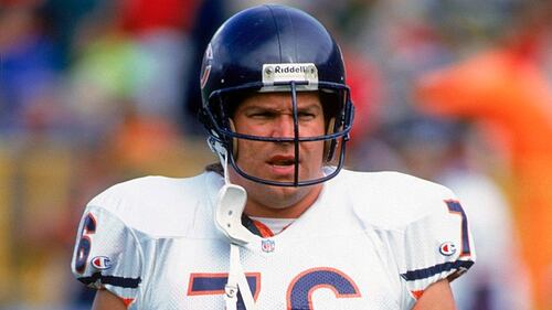 Steve McMichael on a football field.